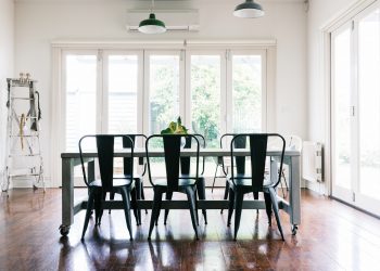 Gorgeous vintage styled light bright dining room with bifold doors