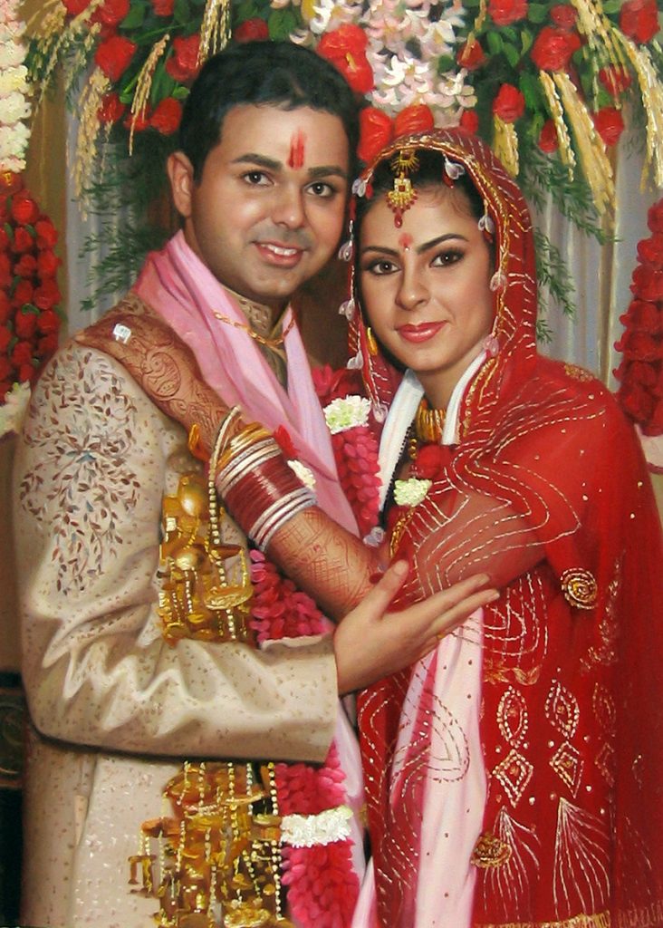 A bright custom canvas painting of an Indian couple on their wedding day done in oil paints.