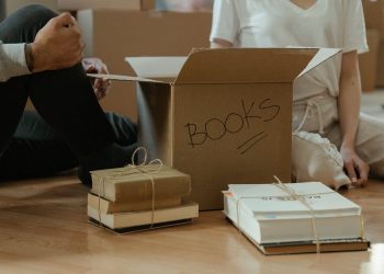 Brown Cardboard Box on Brown Wooden Table