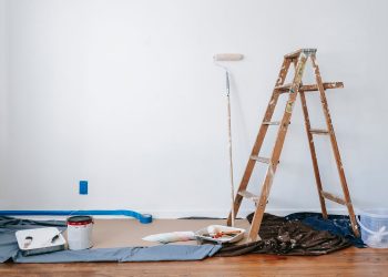 Brown Wooden Ladder Beside Painting Materials