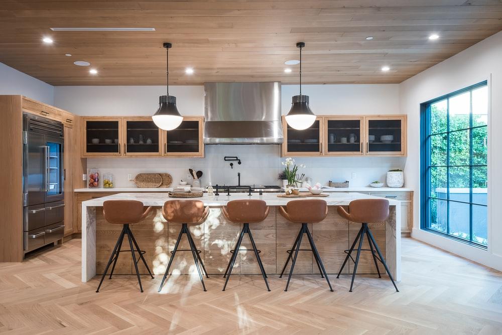 brown wooden table with chairs