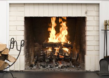 Fireplace with fire burning