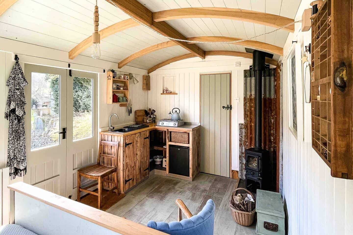 Cozy Retreats Redefined: Interior Design Hacks for Shepherd's Huts with a Small Wood-Burning Stove